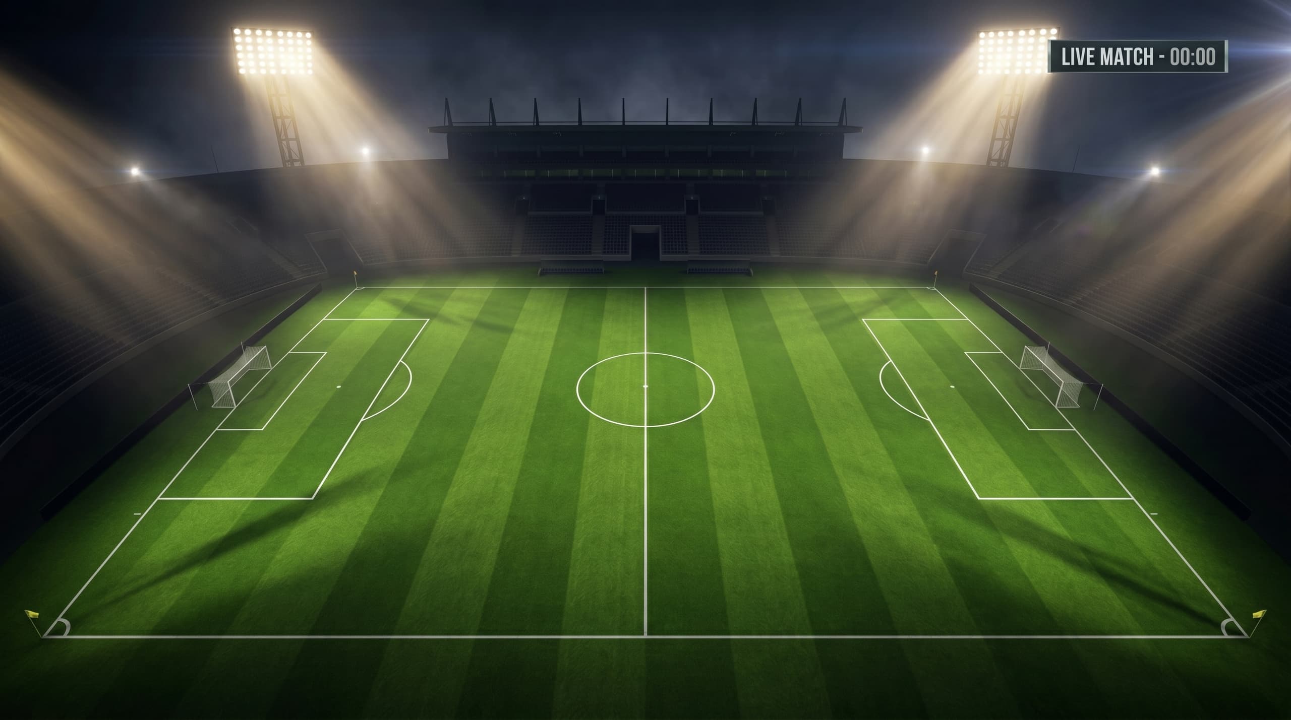 Floodlit football stadium at night